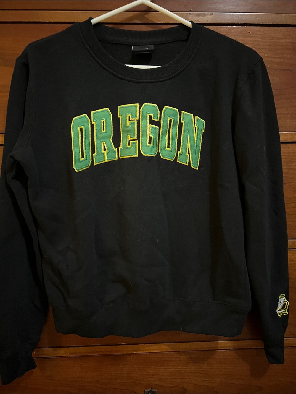 Oregon Ducks!! 
Black Crewneck Sweatshirt with Green & Yellow Oregon Applique
